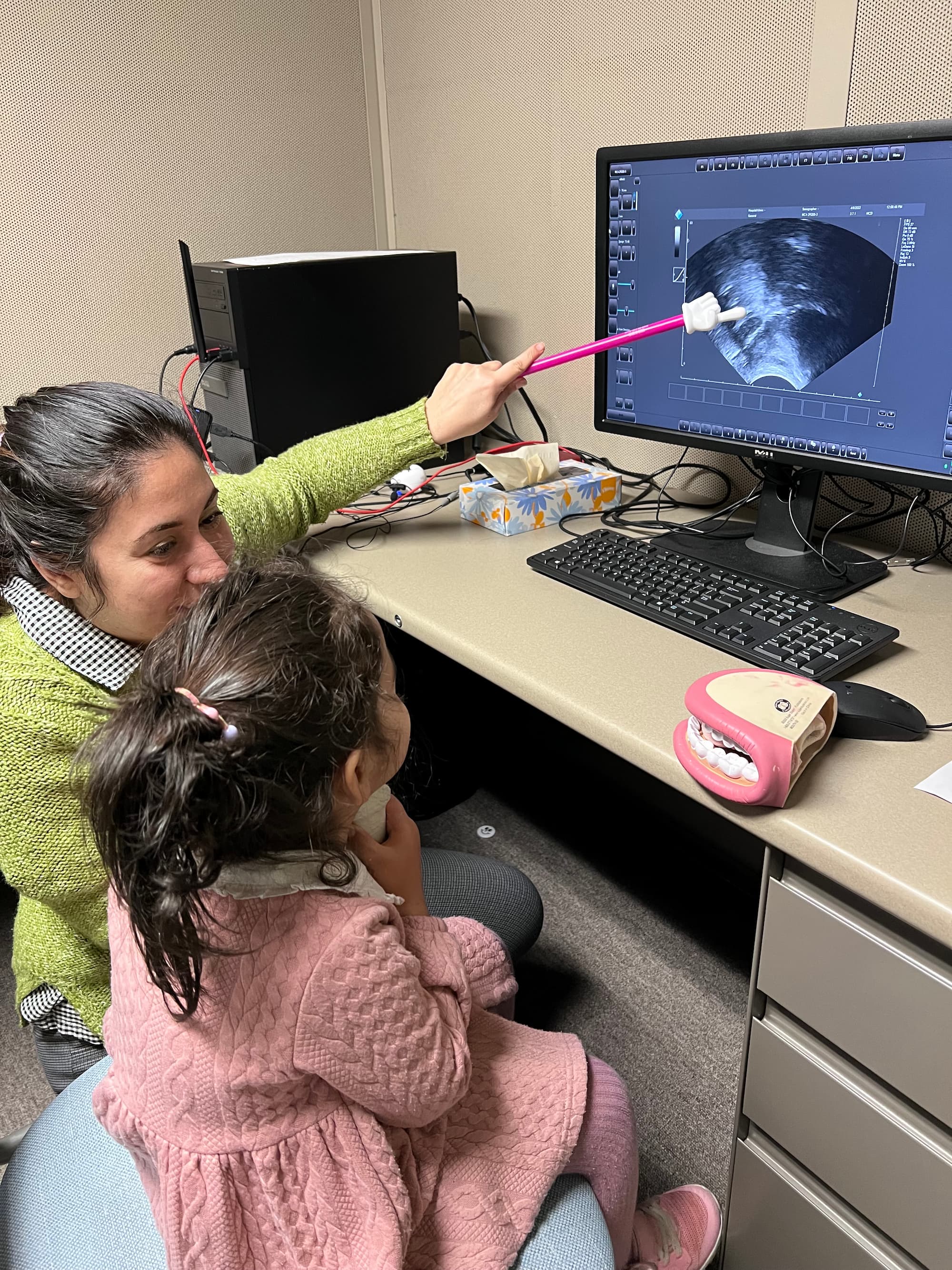 Dr. Hashemi Hosseinabad working with a child