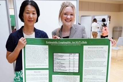 Dr. Aoyama and Kelsey Adair at the HPS Graduate Student Research day 2025