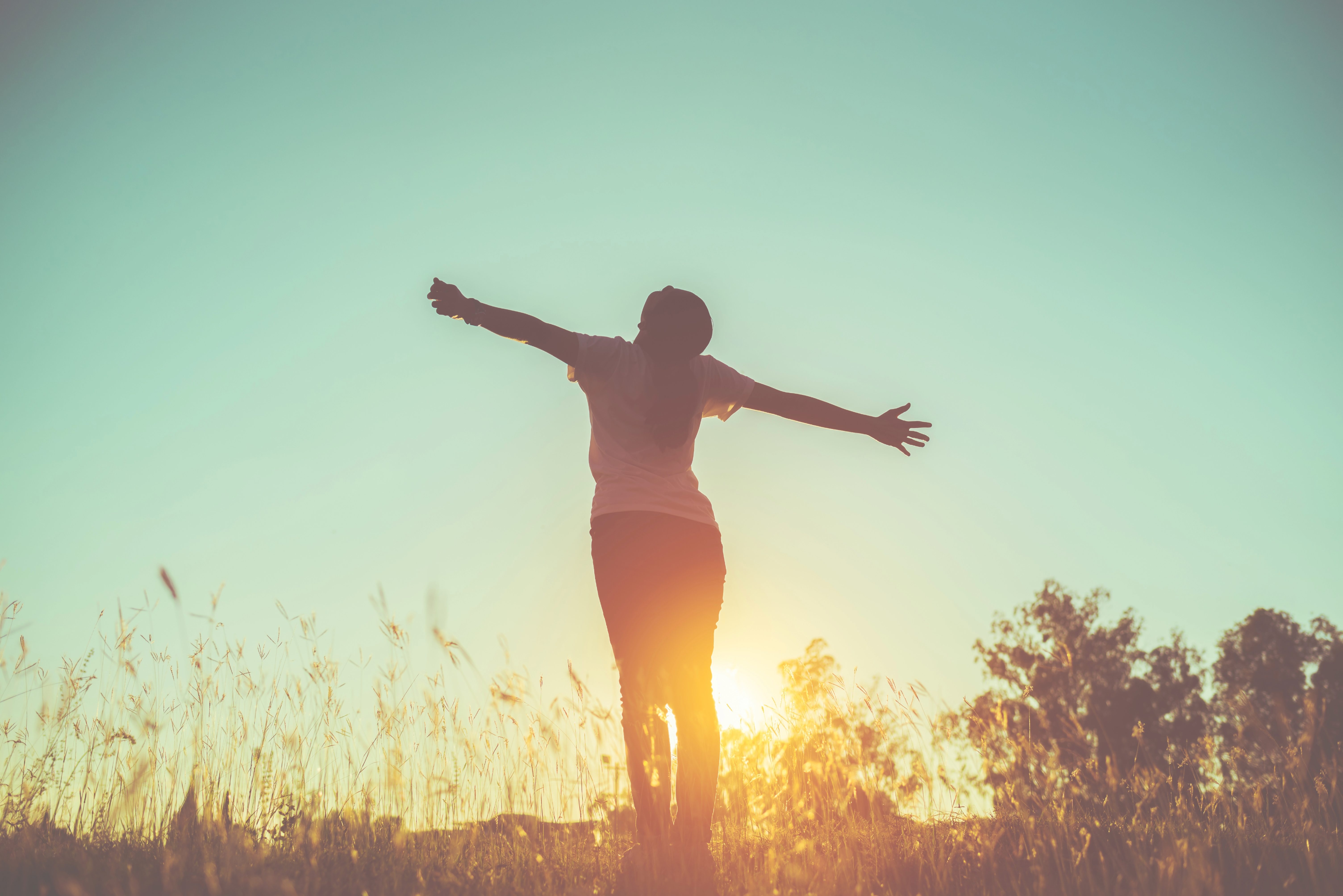 Woman stretching in the sunshine