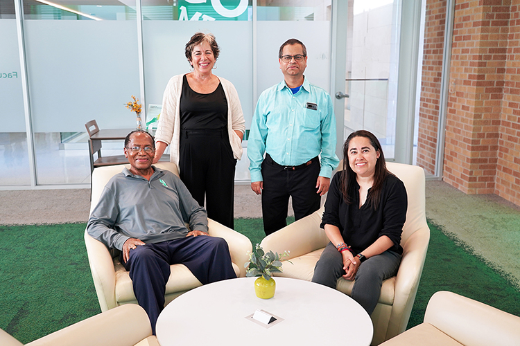 4 Faculty members posing for a picture
