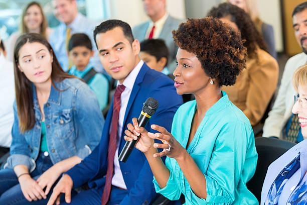 Woman speaking to a crowd